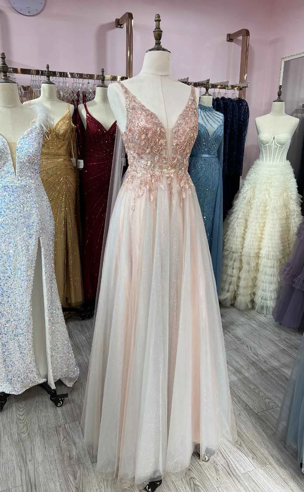 Deep V-Neck Tulle Crystal Formal Gown with Sequin Embellishments