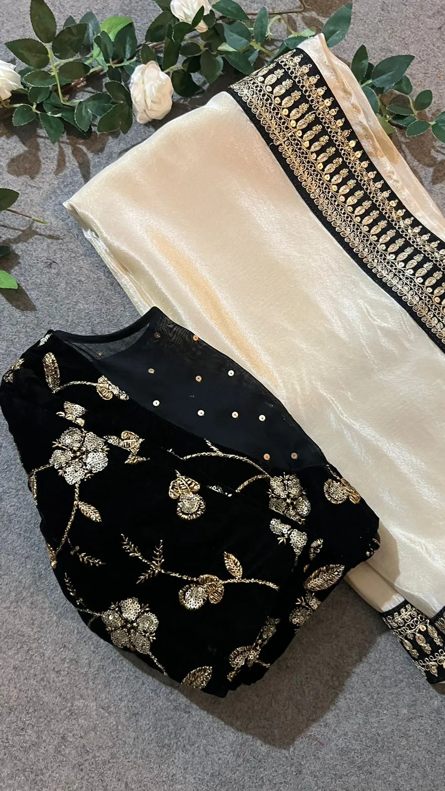 Golden silk saree with black hand work blouse