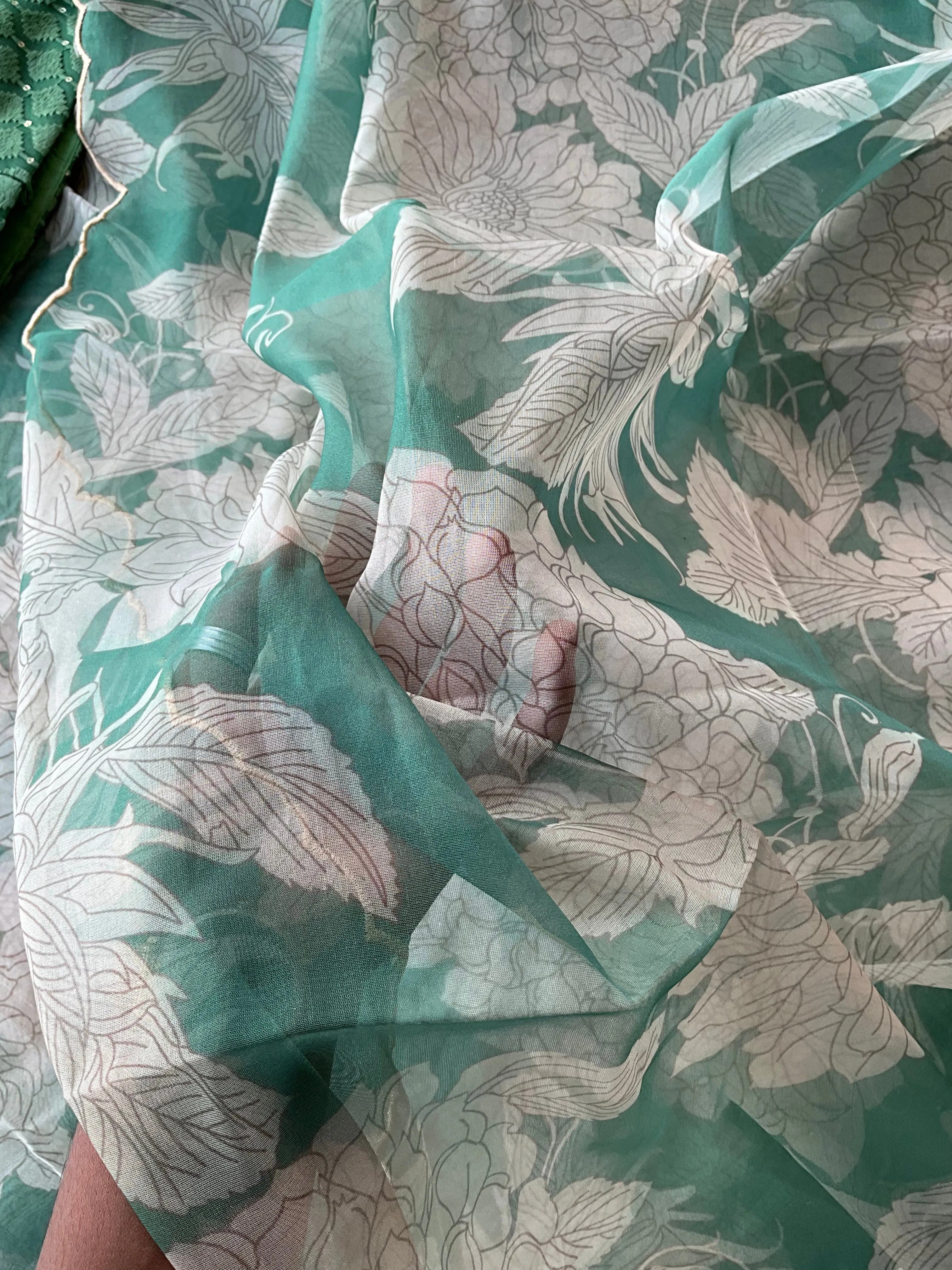 Green floral organza saree with emerald embroidery blouse