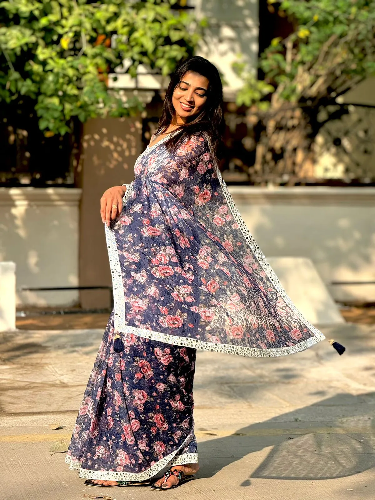 Netted floral designer saree with hand worked blouse