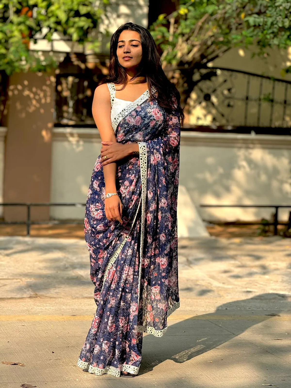 Netted floral designer saree with hand worked blouse